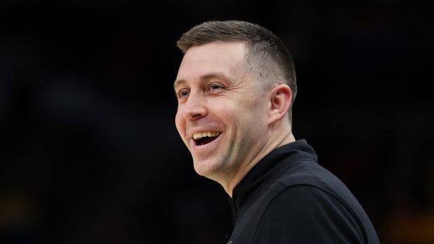 Ohio State Buckeyes interim head coach Jake Diebler reacts during the first half against the Iowa Hawkeyes at Target Center.